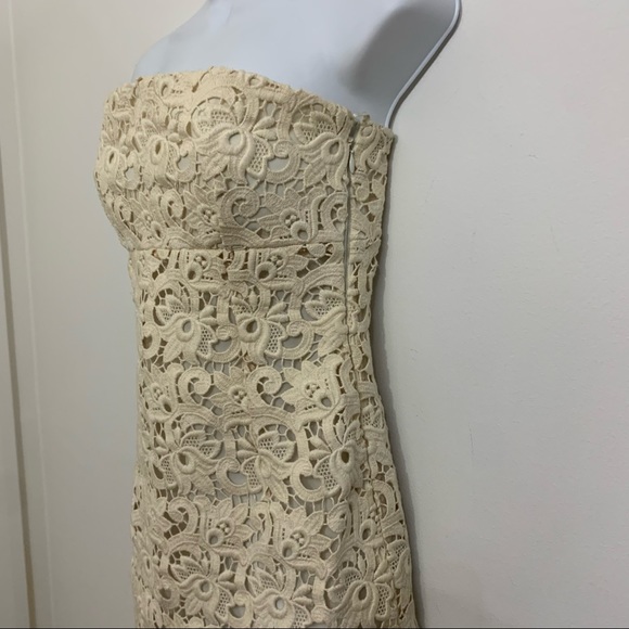 Ivory lace dress by Michael Kors is in like new condition. Size 2 - Picture 8 of 16